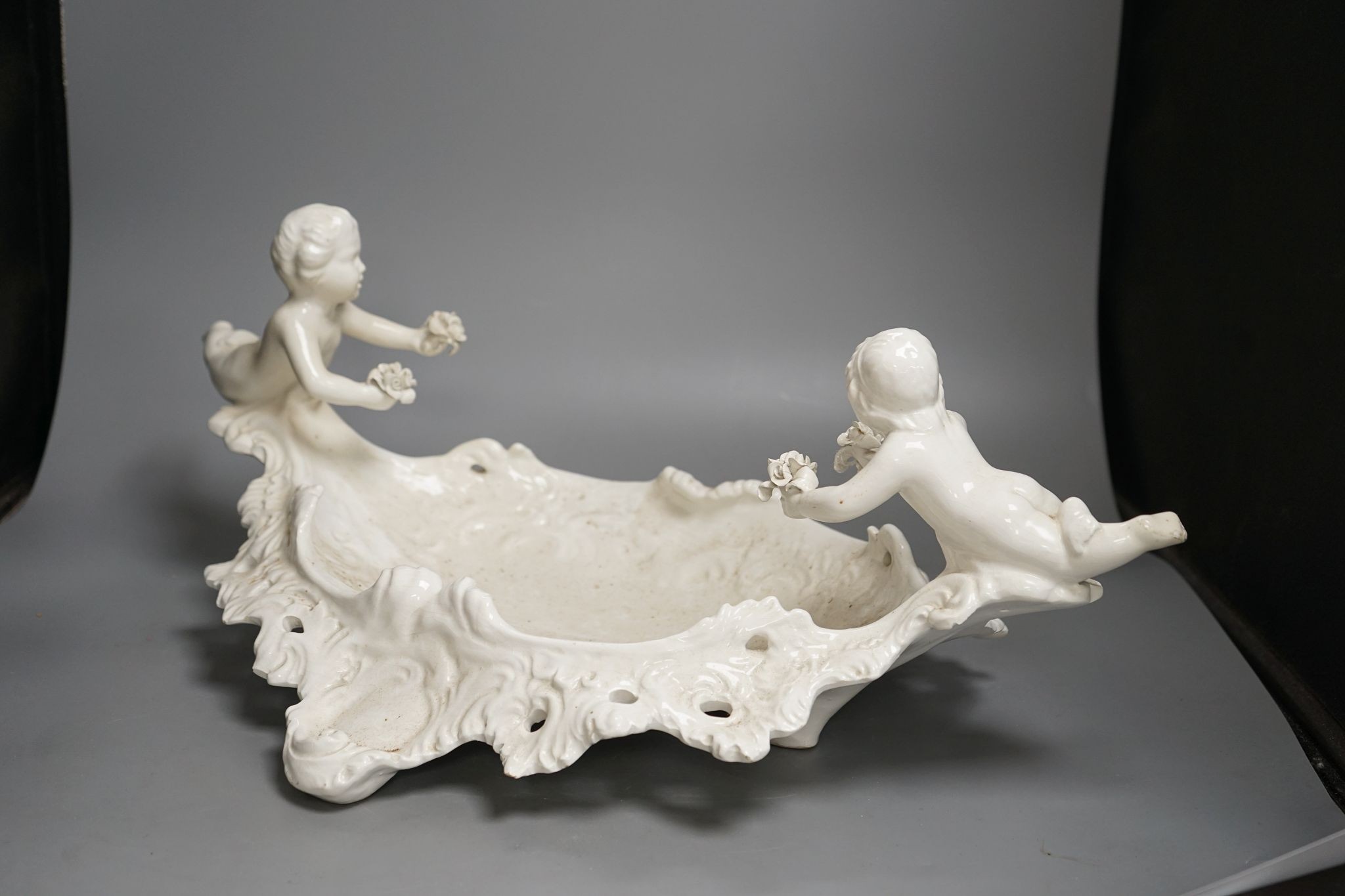An Italian glazed pottery centrepiece, 63cm